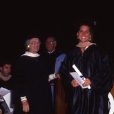 1992 Lynn Commencement: Dina Bickel presents the Medina McMenimen Bickel Fashion Award to Candace Lea Sargent