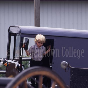 Young Amish boy exits buggy