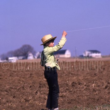 Amish boy flying kite 3