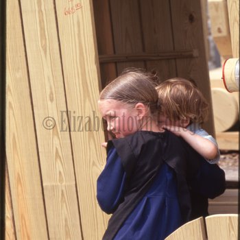 Amish girl on playground