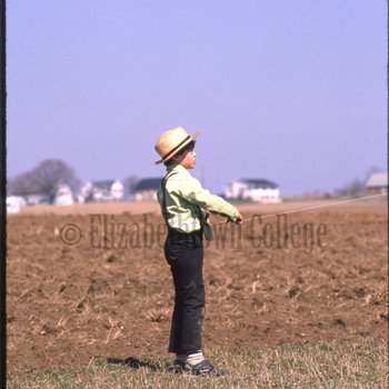 Amish boy with kite
