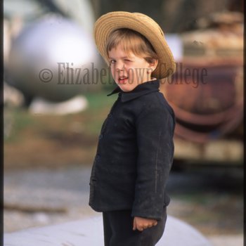 Amish boy winking