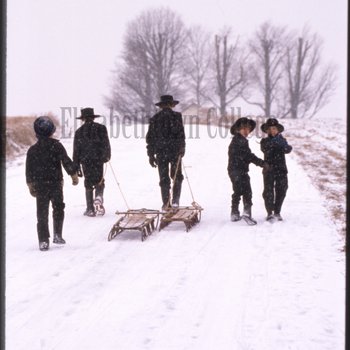 Amish children walk in snow 2