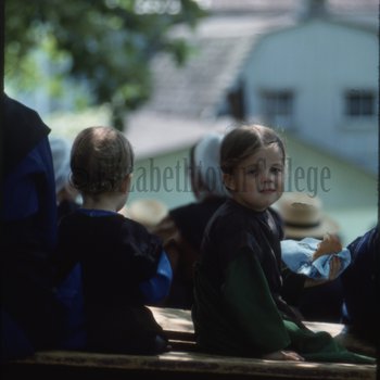 Amish girls on bench
