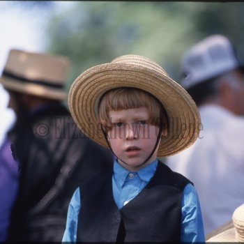 Amish boy looking into camera