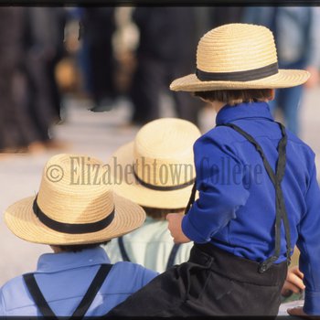 Amish boys face away from camera