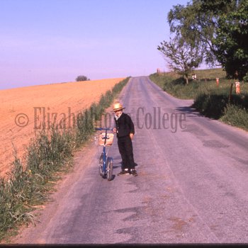 Amish boy with scooter