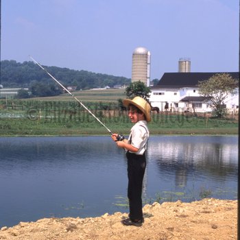Amish boy fishing