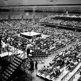 Audience waits for wrestling match B