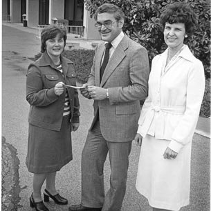 Thomas Jefferson Library Director, Robert Miller, Receives Check from Faculty Women Carole Hale and Mary Jones, C. 1976 691