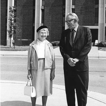 Chancellor Glen Driscoll with Mrs. Lewis Stadler in Front of Stadler Hall 2516