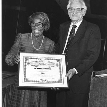 Arnold Grobman, Chancellor, Receiving Urban League Award from Marie Burrows 2557