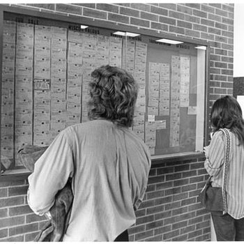 University Center - Student Looking at Bulletin Board C. 1970s 2883
