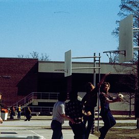 Students Playing Basketball Near J.C. Penney Building 3849