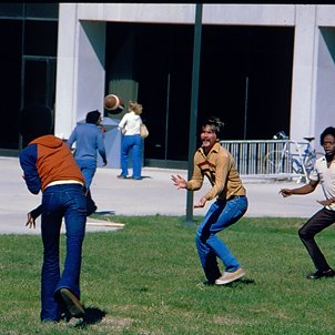 Students Playing Football Near Thomas Jefferson Library, C. 1970s-1980s 3959