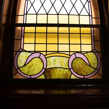 Symbol of Omega Southeast Nave Window 1.10