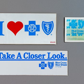 “I ♥ Blue Cross Blue Shield” and "Take a Closer Look" stickers, undated
