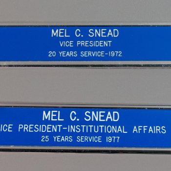 Nameplate(2): "Mel C. Snead." Vice President for 20 an 25 Years of Service