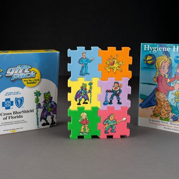 Blue Cross and Blue Shield of Florida “Hygiene Heroes” gift pack with foam puzzle, booklet, and crayon, 2005