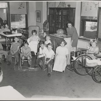 Patients in Hospital Classroom with Teacher at Piano