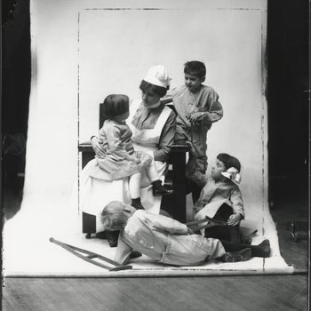 Student Nurse Posing with Children