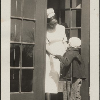 Nurse and Young Patient at Outer Door