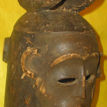 EKOI Culture of Arts from southeastern region of Nigeria and parts of Cameroon- (Janusform Helmet Mask)