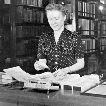 [Arlene N. Marks working at the James White Memorial Library]
