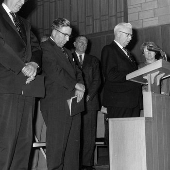 [Harry Tippett offering the dedicatory prayer at the James White Library Dedication]