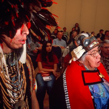 Thomas Davis, left, and Lydia George of the Tlingit Nation celebrate the return of the Bear Clan Totem, October 20, 2003