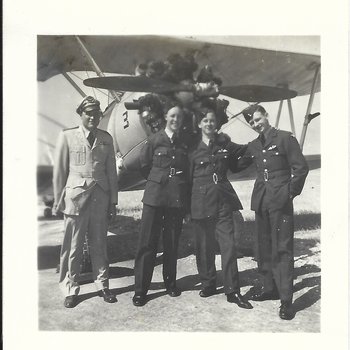 Course 21 Graduation Joe Feigel with three RAF cadets wearing their wings by PT-17