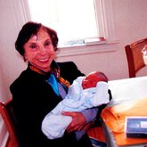 Roz holding grandchild 2
