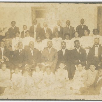 Dr. Isham A. White With Group of Unidentified People