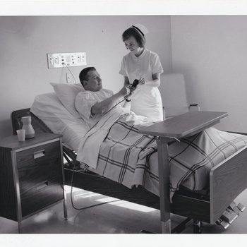 Patient learning to use bed controls, 1965