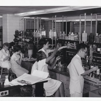 Illinois Masonic laboratory staff conducting tests, 1965