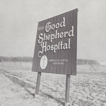 Future site of Good Shepherd Hospital sign, 1973