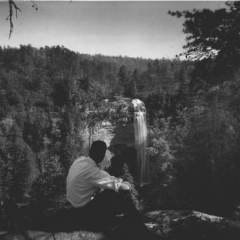 A view of the Fall Creek Falls, with J. W. Wheeler of Unionville, Tennessee, in the foreground