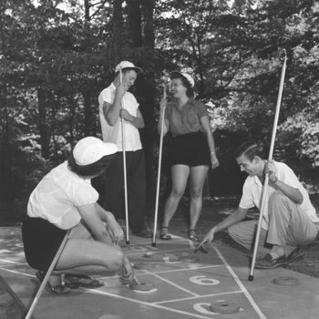 Nora Shopshire, Bobby McAfee, Betty Kidd, and Floyd Hall enjoy a game of shuffleboard at Norris Dam State Park