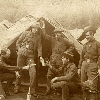 Playful soldiers relieving the boredom of camp life, 1898