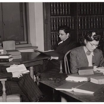 Students studying in the law library