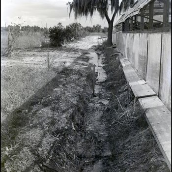 Trench next to building, Freeport, Grand Bahama Island, Bahamas, B