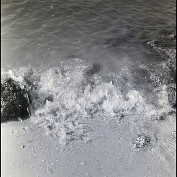 Water at shoreline, Freeport, Grand Bahama Island, Bahamas, C