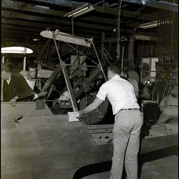 Men Work on Benoist Model 14-B Airboat, G