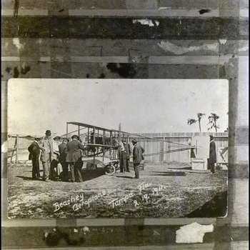 Men Inspect Lincoln Beachey's Aeroplane at Census Celebration, A
