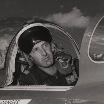 Colonel Walter E. Williams sitting in cockpit of a Lockheed F-86 Sabre, ca. 1958