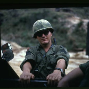 Christopher Ammons Qui Nhơn, Vietnam (hanging off jeep)