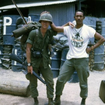 Members of the 1st SIgnal Brigade, Qui Nhơn, Vietnam, 1969-1970 (man in full uniform and one in t shirt)