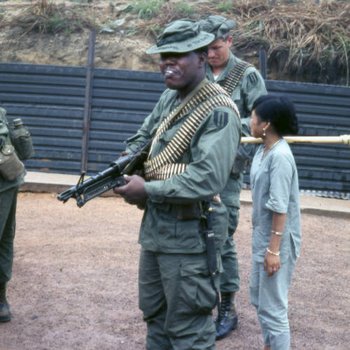 Members of the 1st SIgnal Brigade, Qui Nhơn, Vietnam, 1969-1970 (two soldiers, and woman)