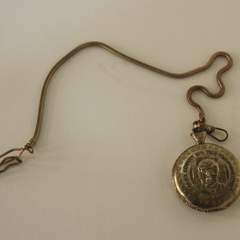 25th Anniversary gold pocket watch, closed