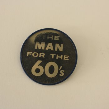 Man for the 60s holographic campaign button, 003